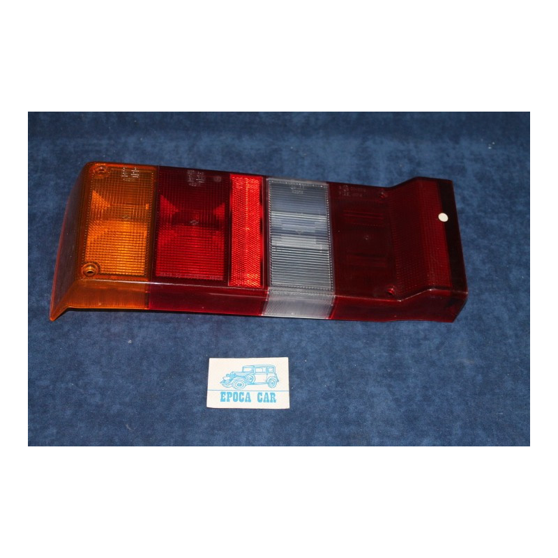Y10   PLASTICA PER FANALINO POST. SX  CON RETRO   ALTISSIMO