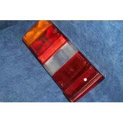 Y10   PLASTICA PER FANALINO POST. SX  CON RETRO   ALTISSIMO