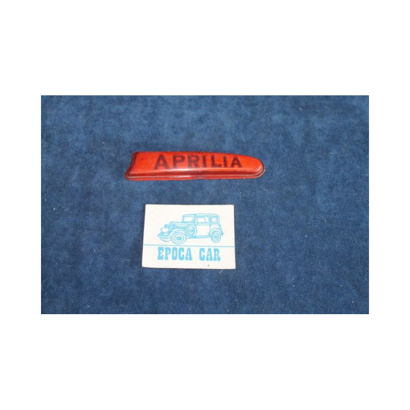 APRILIA   PLASTICA ARANCIONE SCRITTA "APRILIA" PER LUCE TARGA