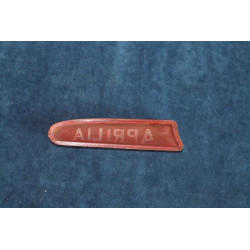 APRILIA   PLASTICA ARANCIONE SCRITTA "APRILIA" PER LUCE TARGA