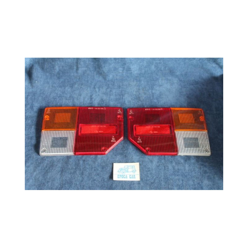 128 U.T.  COPPIA PLASTICHE PER FANALINI POST.   ARIC