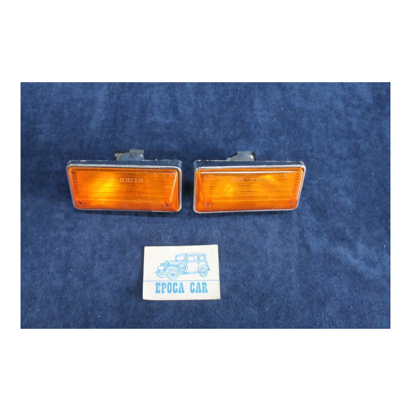 124 SEDAN  PAIR ORANGE FRONT LIGHTS  (PLASTIC)    ARIC