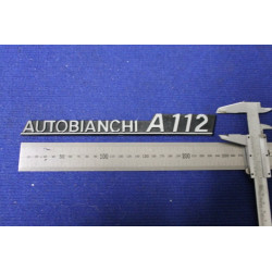 EMBLEM "AUTOBIANCHI A 112"  SILVER WRITING  PLASTIC