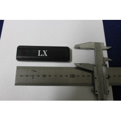 EMBLEM "LX" LATERAL FOR A112  PLASTIC