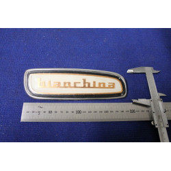 SCRITTA "BIANCHINA" (COPRIRADIO) PLASTICA SU PLANCIA DI METALLO CROMATO