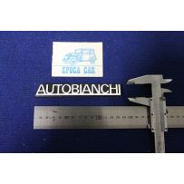 EMBLEM "AUTOBIANCHI"  METAL CHROME IN PLASTIC BACKGROUND