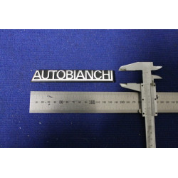 SCRITTA "AUTOBIANCHI"  METALLO CROMATO SU FONDO PLASTICA