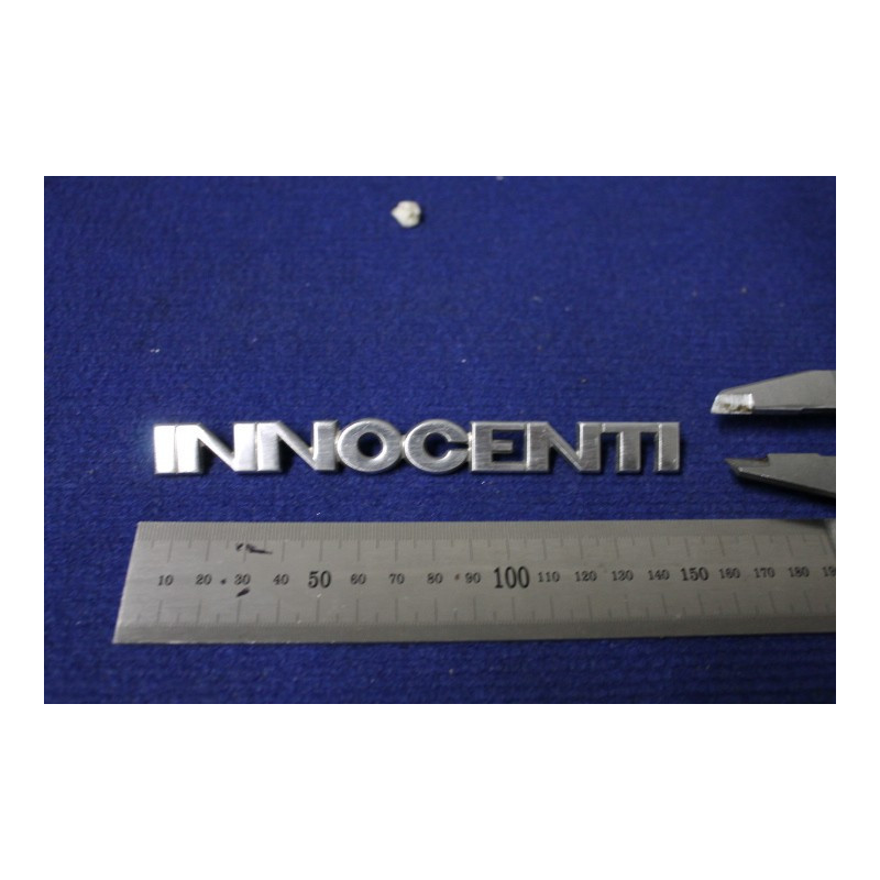 EMBLEM "INNOCENTI" (LENGHT  150mm)  METAL CHROME