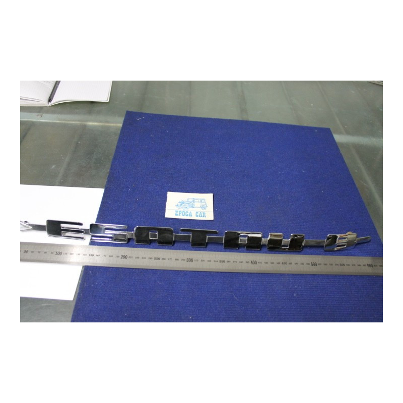 SCRITTA "ESATRAU B"  LUNGH. 610 mm  METALLO CROMATO