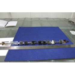 SCRITTA "ESATRAU B"  LUNGH. 610 mm  METALLO CROMATO