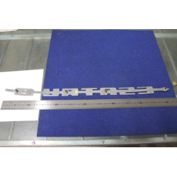 SCRITTA "ESATRAU B"  LUNGH. 610 mm  METALLO CROMATO